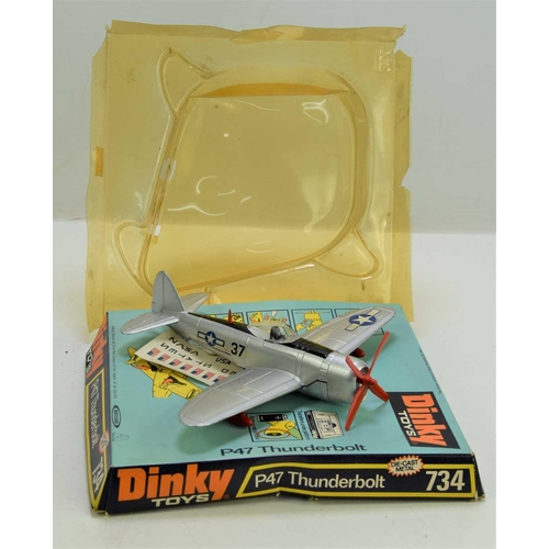 354 - A Dinky Toys diecast model of a P47 Thunderbolt with battery operated motor, no. 734, unused decal s... 