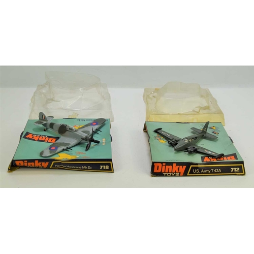 355 - Two Dinky Toys diecast models of a Hurricane MkII and a U.S Army T 42A, model numbers 718 and 712, b... 