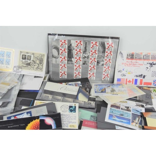 387 - A large group of Royal Mail mint commemorative and definitive stamps together with a quantity of GB ... 