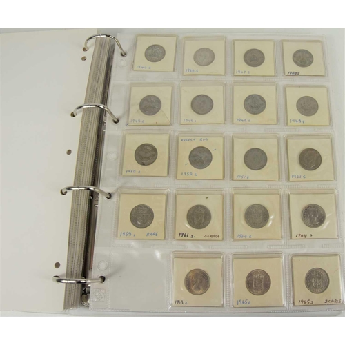 390 - An album of GB coins to include silver shillings, sixpences, half crowns, farthings and others.