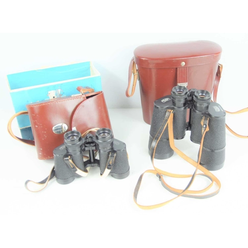 442 - Two pairs of Carl Zeiss binoculars comprising of Jenoptem 10 x 50 and 8 x 30.