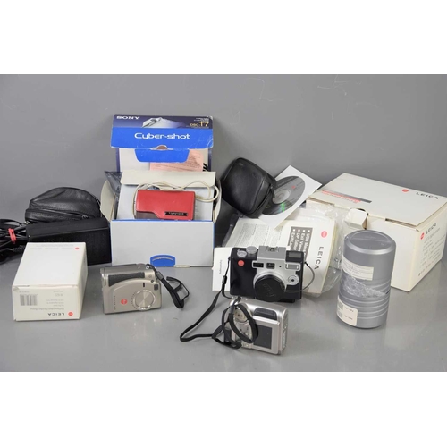 444 - Three Leica cameras comprising of digilux 4.3, digilux 1 and a digilux zoom with original box, a Lei... 