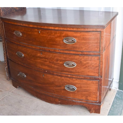 481 - A 19th century mahogany three drawer bow front chest, which splits in the middle, raised on bracket ... 