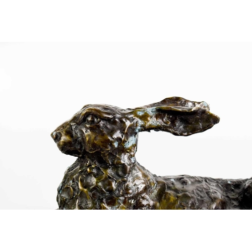 184 - John Cox (1952-2014): A life size bronze of a resting hare, cast by the lost wax method, foundry mar... 