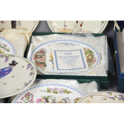 205 - A Royal Worcester set of six coffee cans and saucers decorated with flowers in a fitted box together... 