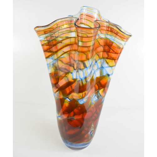 246 - A large glass handkerchief vase, in graduated undulating shades of orange, blue and green.