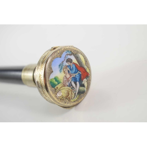 295 - A Continental walking cane with a silver and enamel pill box on top depicting two young lovers, 93cm... 