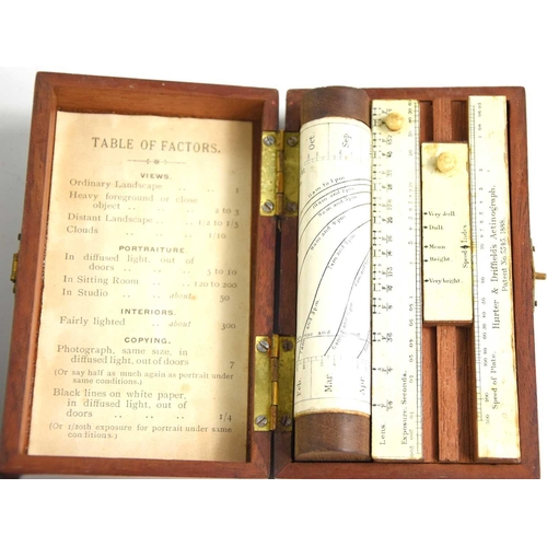 304 - A late 19th century cased actinograph by Hurter & Driffields together with Otis Kings calculator.