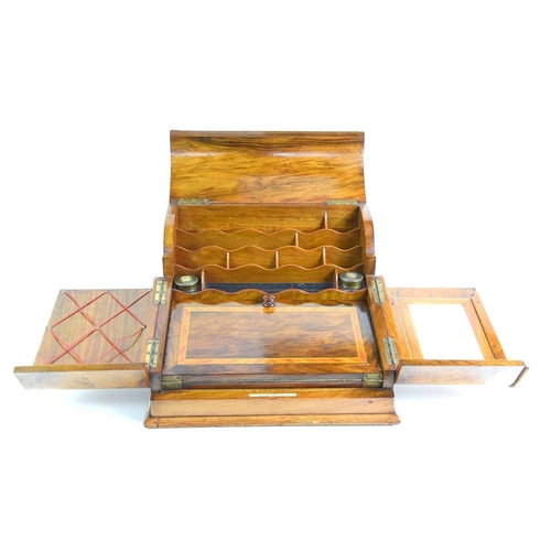 315 - A 19th century Suter & Alexander walnut ladies table top writing box, opening to reveal a folding ba... 