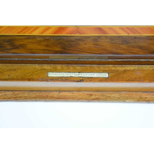 315 - A 19th century Suter & Alexander walnut ladies table top writing box, opening to reveal a folding ba... 