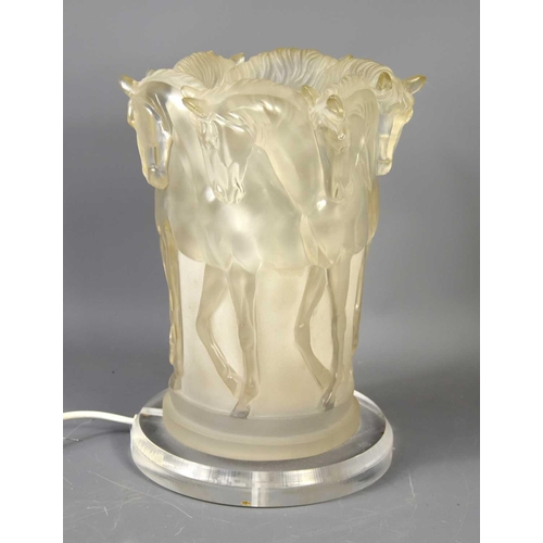 378 - A Mid-Century lucite table lamp in the form of horses, 31cm high.