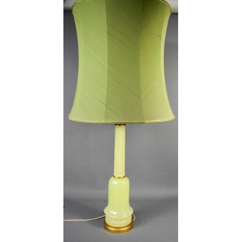 382 - A large Mid Century table lamp, with green glass base, and green shade, 106cm high to top of shade.