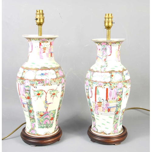 383 - A pair of Chinese vases adapted to table lamps, the vases decorated with figural scenes and flowers,... 