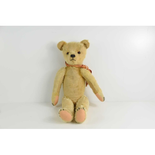 386 - A 1930s/40s straw filled mohair teddy bear.