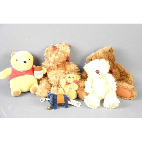 394 - A group of Teddy bears to include examples by Russ and Steiff.