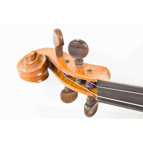 425 - An antique Violin and bow, maple with two piece back.