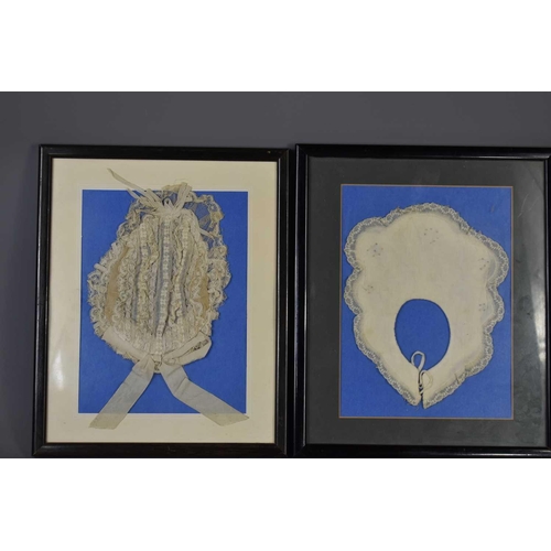 439 - A group of framed antique lace to include a child's bib, bonnet and two cuffs together with a babies... 