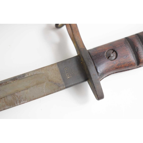 495 - A WWI Remington M1917 bayonet with scabbard, the blade dated 1918 Remington, blade length 43cm.