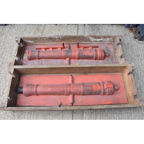 502 - Two large cannon moulds, each of two sections, with wooden frames, used to shape the sand casting fo... 