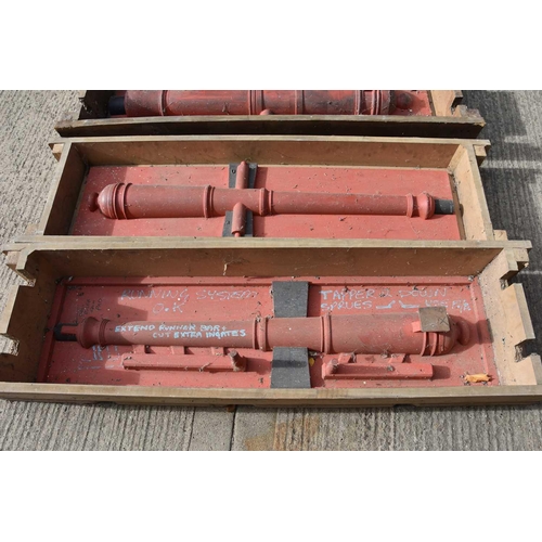 502 - Two large cannon moulds, each of two sections, with wooden frames, used to shape the sand casting fo... 