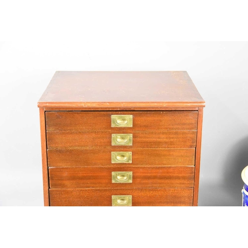 559 - A mahogany collectors or specimen set of six graduated drawers, fitted with brass ring pull handles,... 