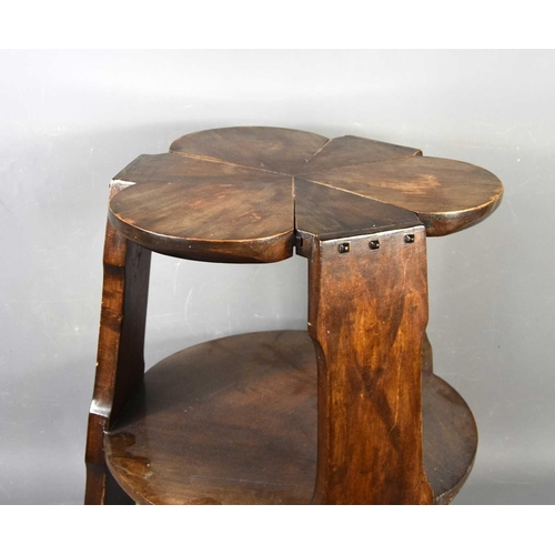 565 - A clover leaf top occasional table, 55cm