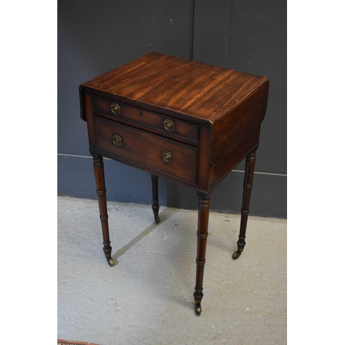 568 - A 19th century mahogany work table with drop leaves and two graduated drawers, raised on bamboo styl... 