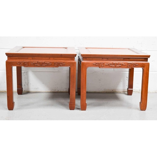 575 - A pair of Chinese hardwood tables with square tops and caned decoration, 60cm by 60cm by 25cm.