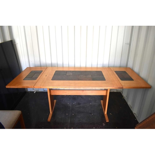 588 - A Mid-Century Gangso Mobler, tile top extending dining table together with four modern chairs.