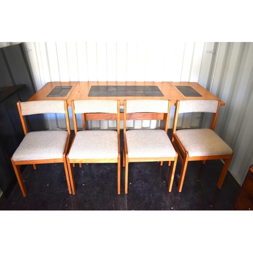 588 - A Mid-Century Gangso Mobler, tile top extending dining table together with four modern chairs.