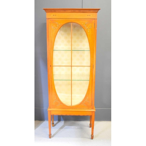 612 - An Edwardian Sheraton Revival satinwood display cabinet, inlaid decoration and painted with ribbons ... 