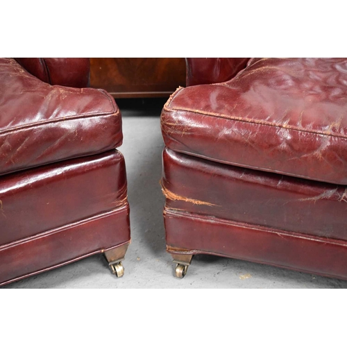 617 - A pair of vintage red leather armchairs and matching stool, made by Century Furniture, Hickory North... 