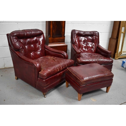 617 - A pair of vintage red leather armchairs and matching stool, made by Century Furniture, Hickory North... 