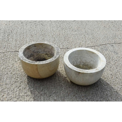 619 - A pair of circular sandstone planters, 13cm high by 40cm diameter.