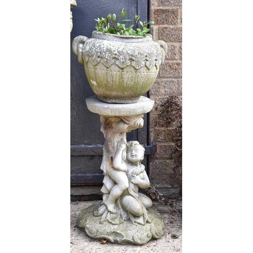 627 - A reconstituted stone cherub pedestal together with an urn form planter, 78cm high.