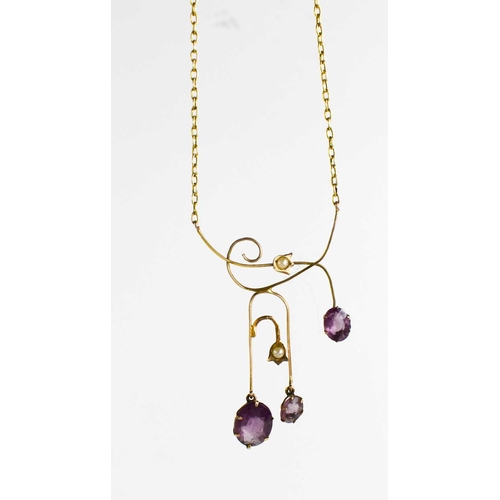 102 - A Edwardian 9ct gold, amethyst and seed pearl set pendant necklace, 3.82g, together with a green gla... 