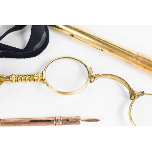 106 - A group of collectables to include gold plated Swan Pen, a pair of gold plated folding spectacles, a... 