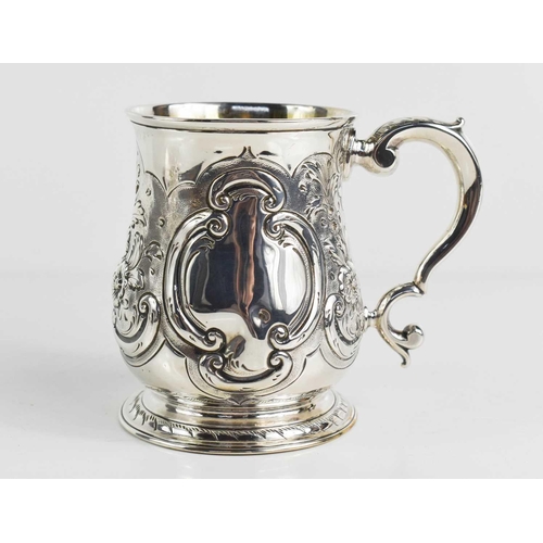 155 - A Georgian silver tankard, with chased and repousse decoration, and gilded interior, 6.85toz, inscri... 