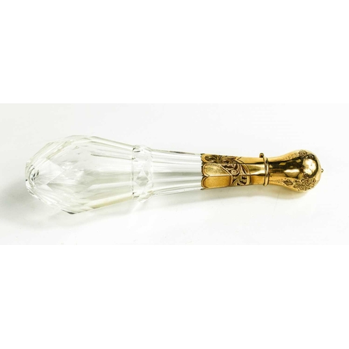 19 - A fine cut glass and gold plated scent bottle, the bulbous cover opens to reveal a silver mounted co... 