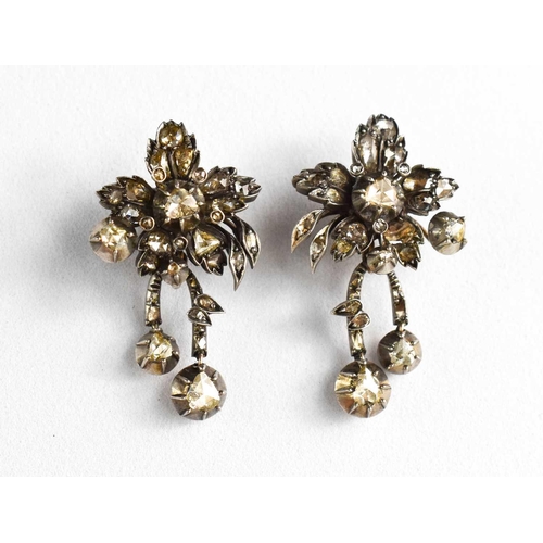 2 - A pair of Georgian early 19th century white metal (unmarked) and diamond stud earrings, each in the ... 