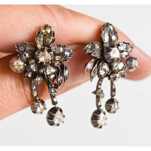 2 - A pair of Georgian early 19th century white metal (unmarked) and diamond stud earrings, each in the ... 