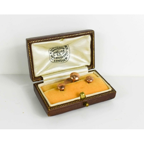 23 - A 9ct rose gold collar stud set in the original presentation box, 2.45g.