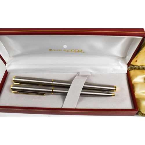 239 - Two Shaeffer ball point pens, in the original presentation box, together with two vintage Parker exa... 