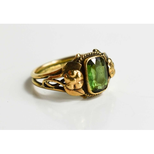 28 - A 19th century 9ct rose gold and green garnet ring, the rectangular cushion cut stone set with a rop... 