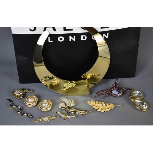 293 - A group of costume jewellery including a pair of tear drop shaped Christian Dior earrings set with p... 