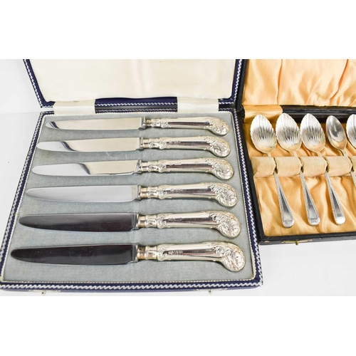 297 - A cased set of silver handled butter knives together with a part set of Victorian silver teaspoons.