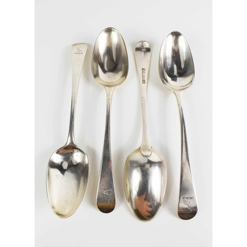 306 - A set of four George III serving spoons in the Old English pattern, armourial engraved, George Smith... 