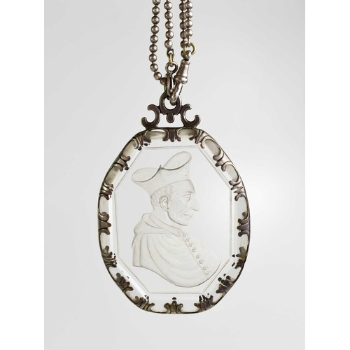 33 - A 19th century silver and intaglio, likely rock crystal pendant necklace, depicting a Cardinal, 8 by... 