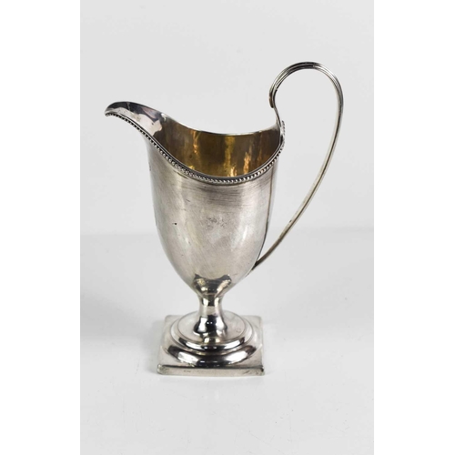 370 - A George III silver helmet form milk jug by Charles Hougham, London 1788, 98g.