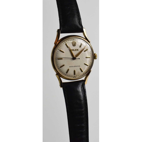 371 - A 1950s 9ct gold Rolex gentlemans wristwatch, the champagne dial wiht gilt baton markes and Rolex em... 